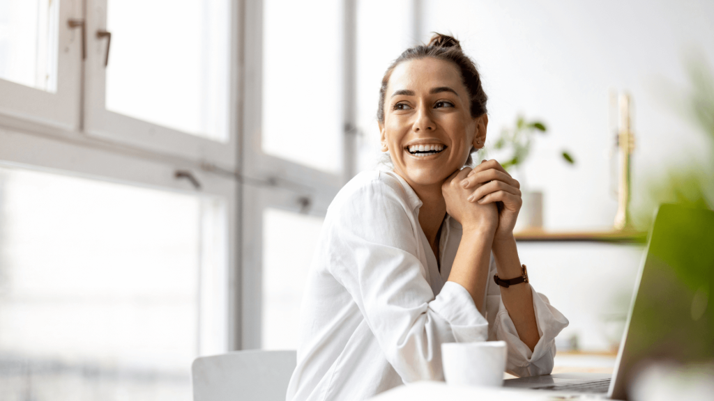 Smiling woman reviewing her options for personal injury claims.